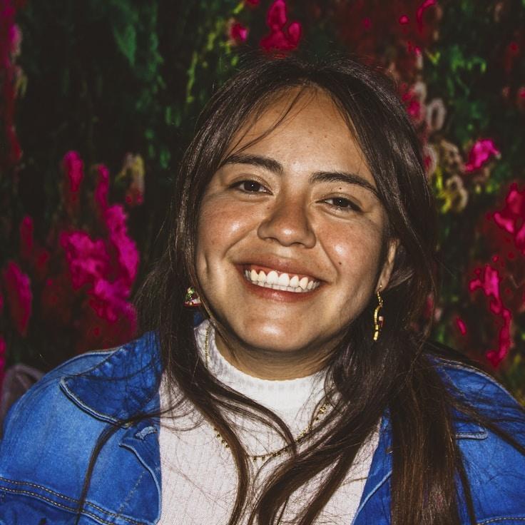 Portrait of Aris Vega, group coordinator and fusion cooking expert